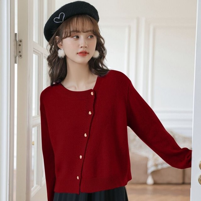 Comodo gilet in cashmere con giocoso dettaglio di bottoni